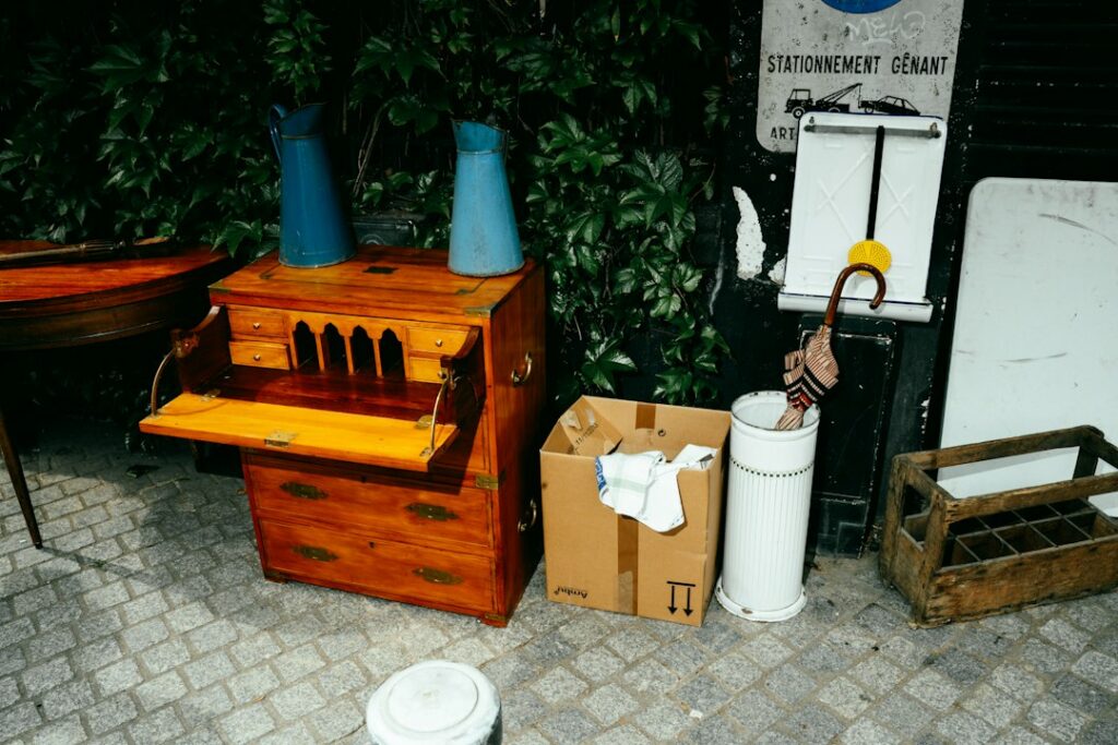 Wooden music box with blue horns and assorted items